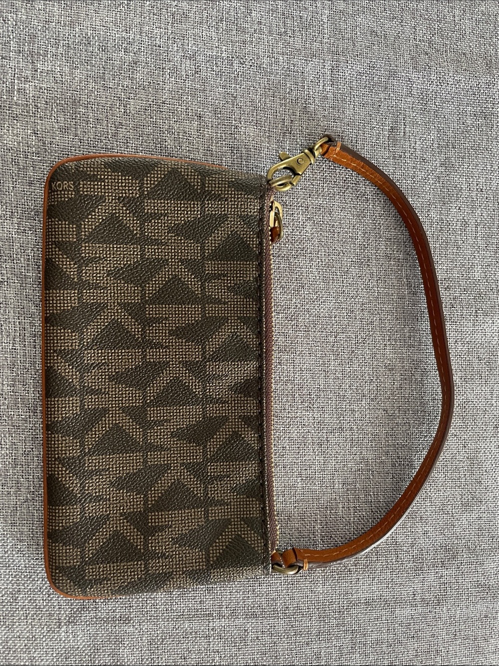 Michael Kors Brown Monogram Wristlet with Tan Leather Strap